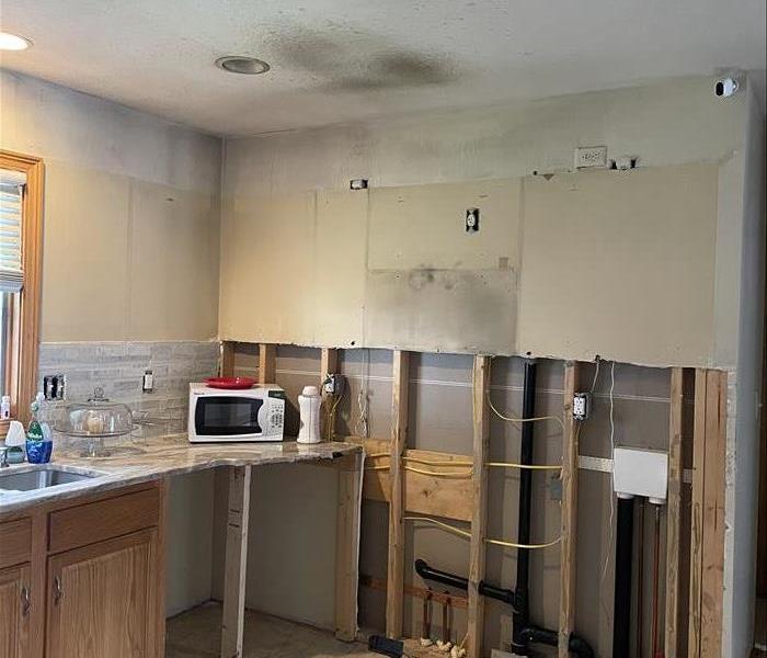 Smoke-damaged kitchen after an oven fire